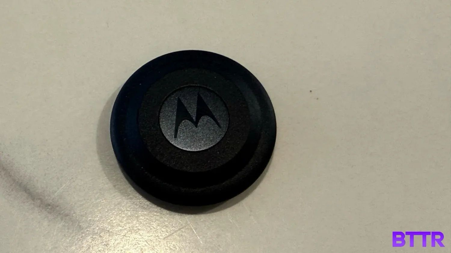 Close up of the Moto Tag tracker