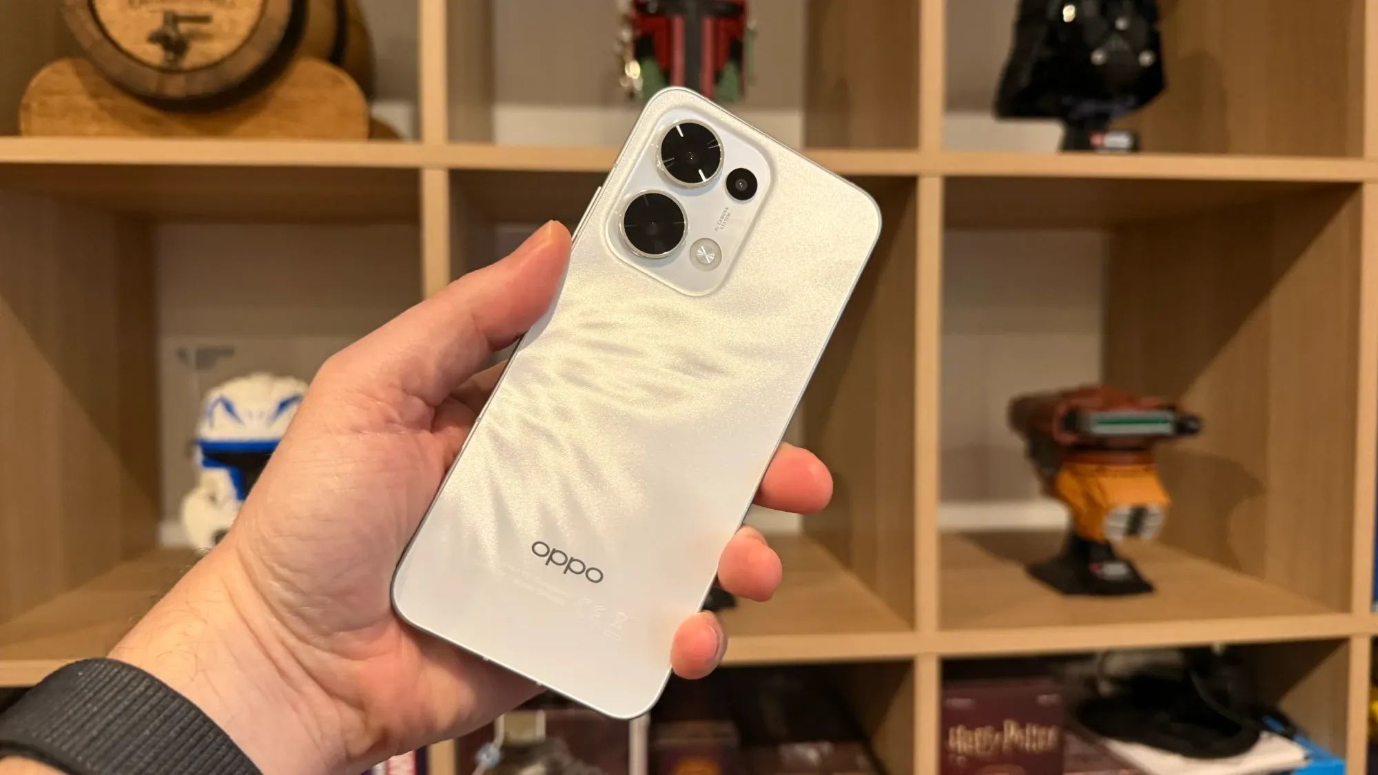 Holding the Oppo Reno 13 in my hand