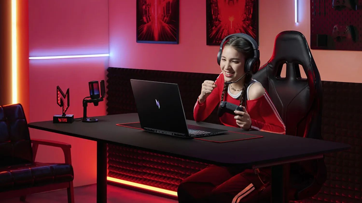 A girl gaming on the new Nitro laptop from Acer