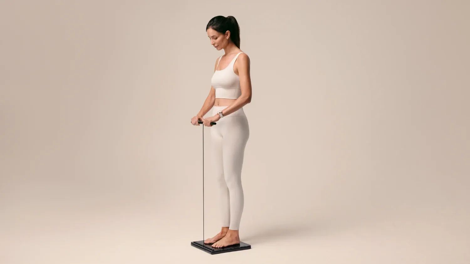 A woman on the new withings body scan 2