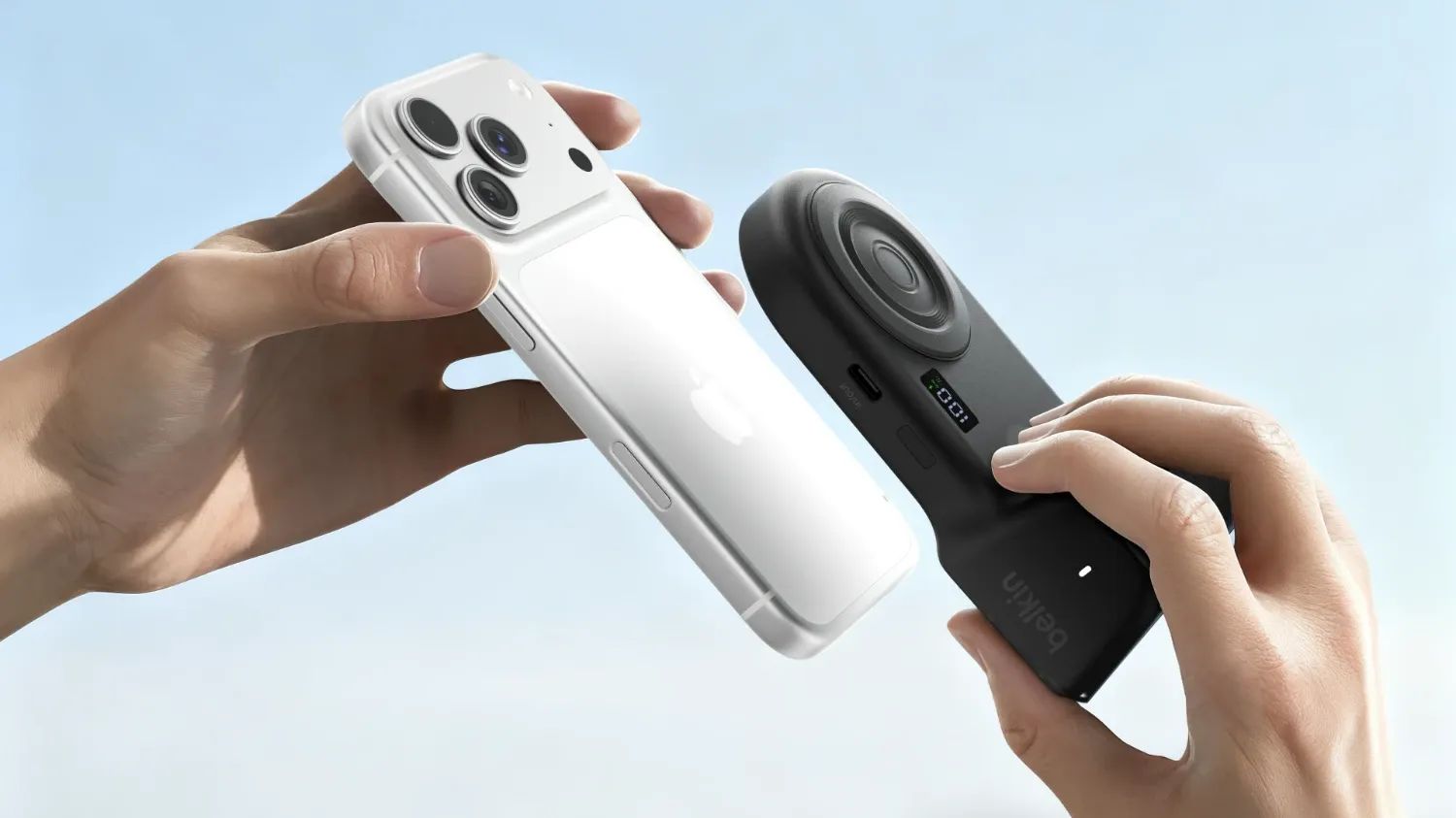 A pair of hands attaching the Belkin Stage Powergrip to an iPhone 17 Pro.