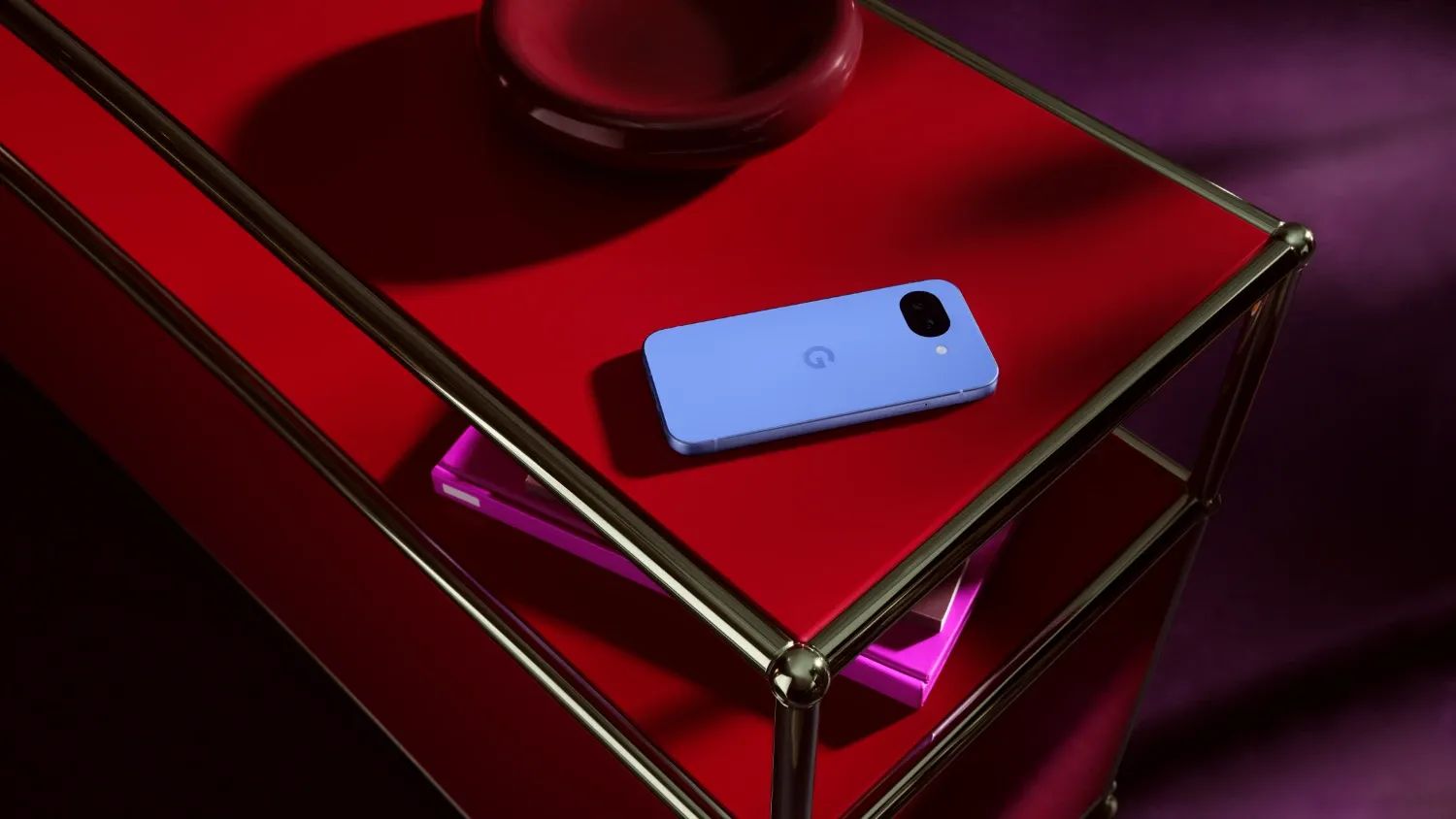 The Pixel 10a on a red trolley or something