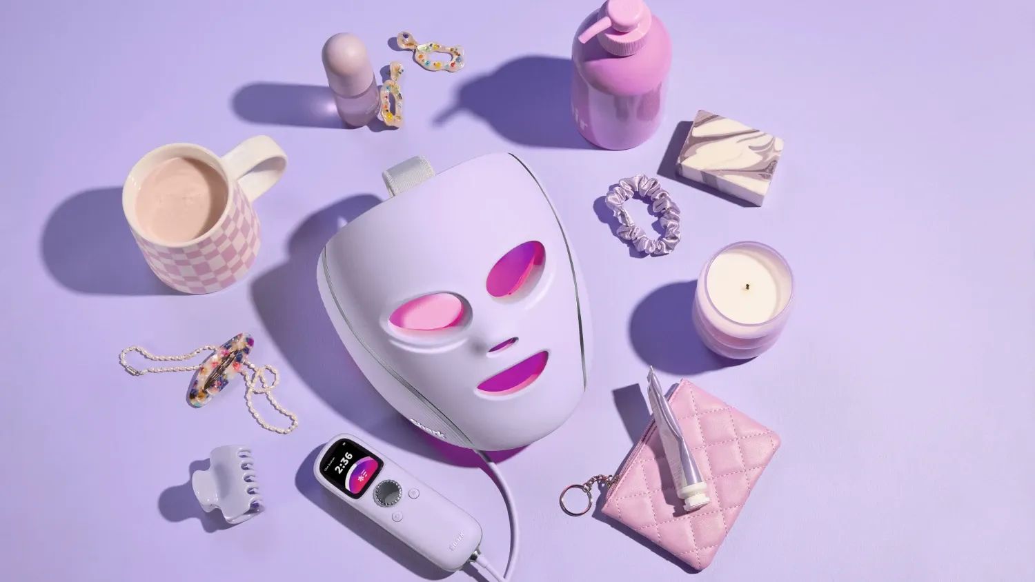 The Shark Cryoglow on a lilac background surrounded by pretty things