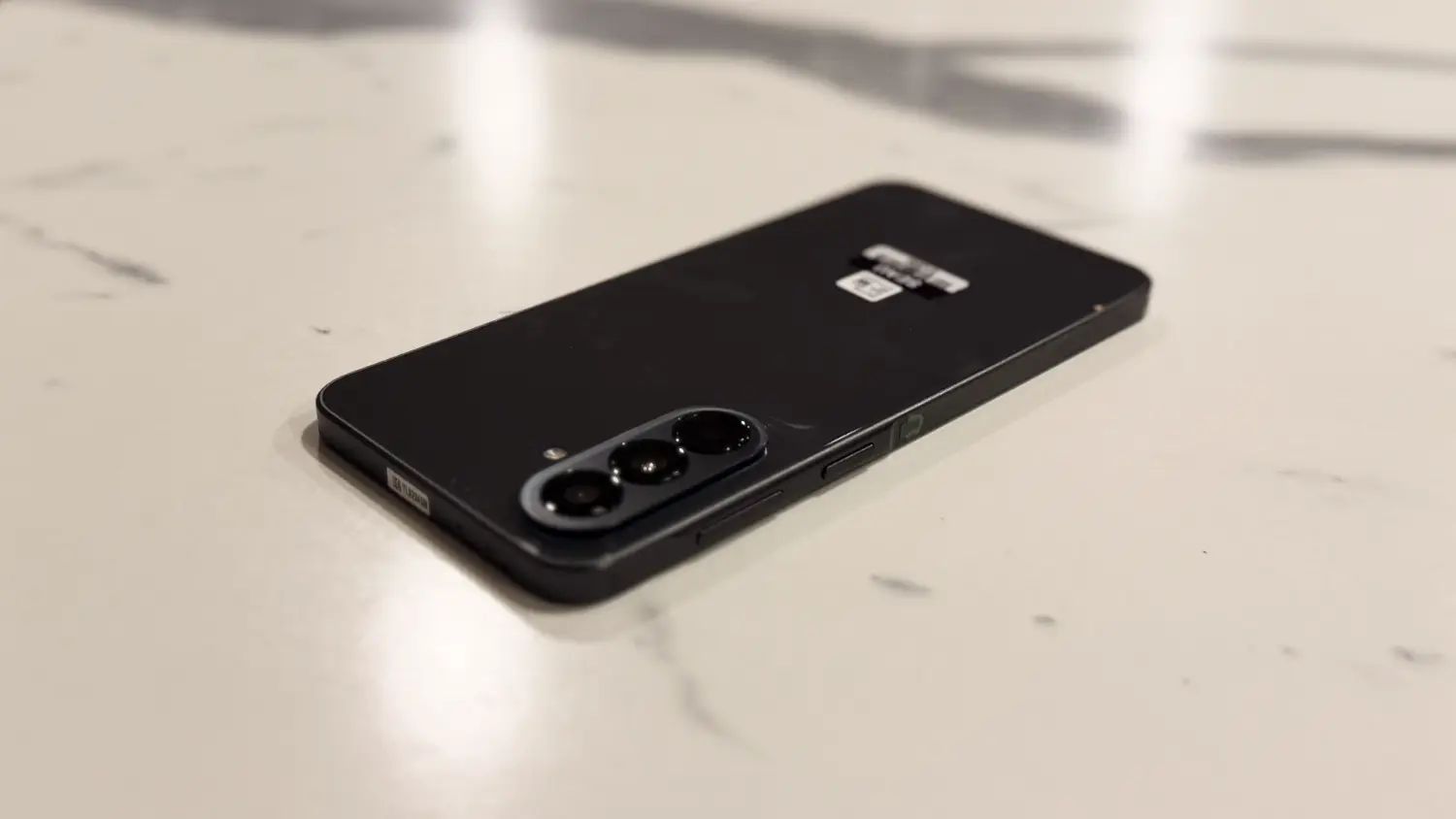 The Galaxy A37 on a faux-marble benchtop