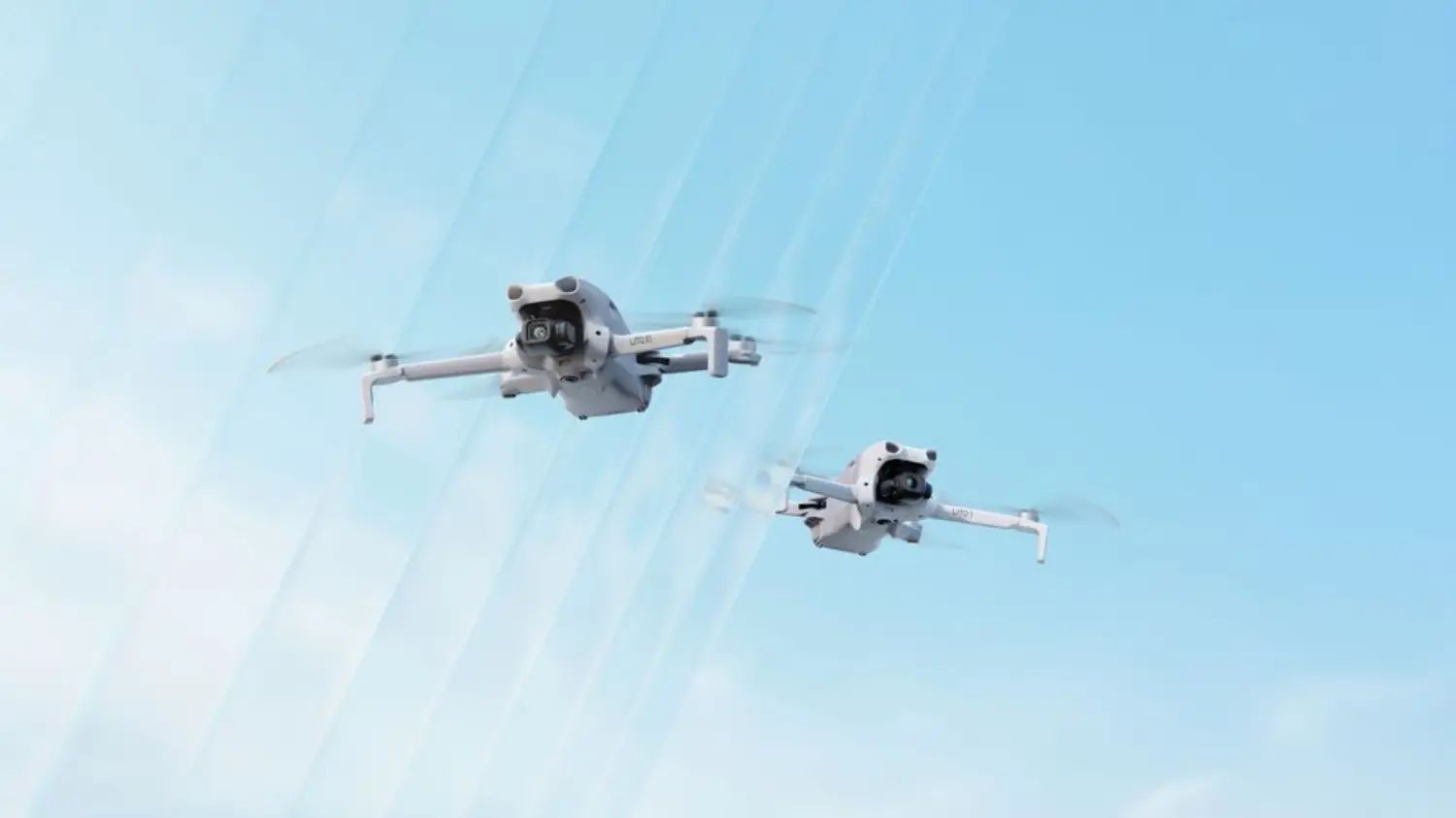 an image of the new dji Lito 1 and Lito X1 flying in a lightly cloudy sky