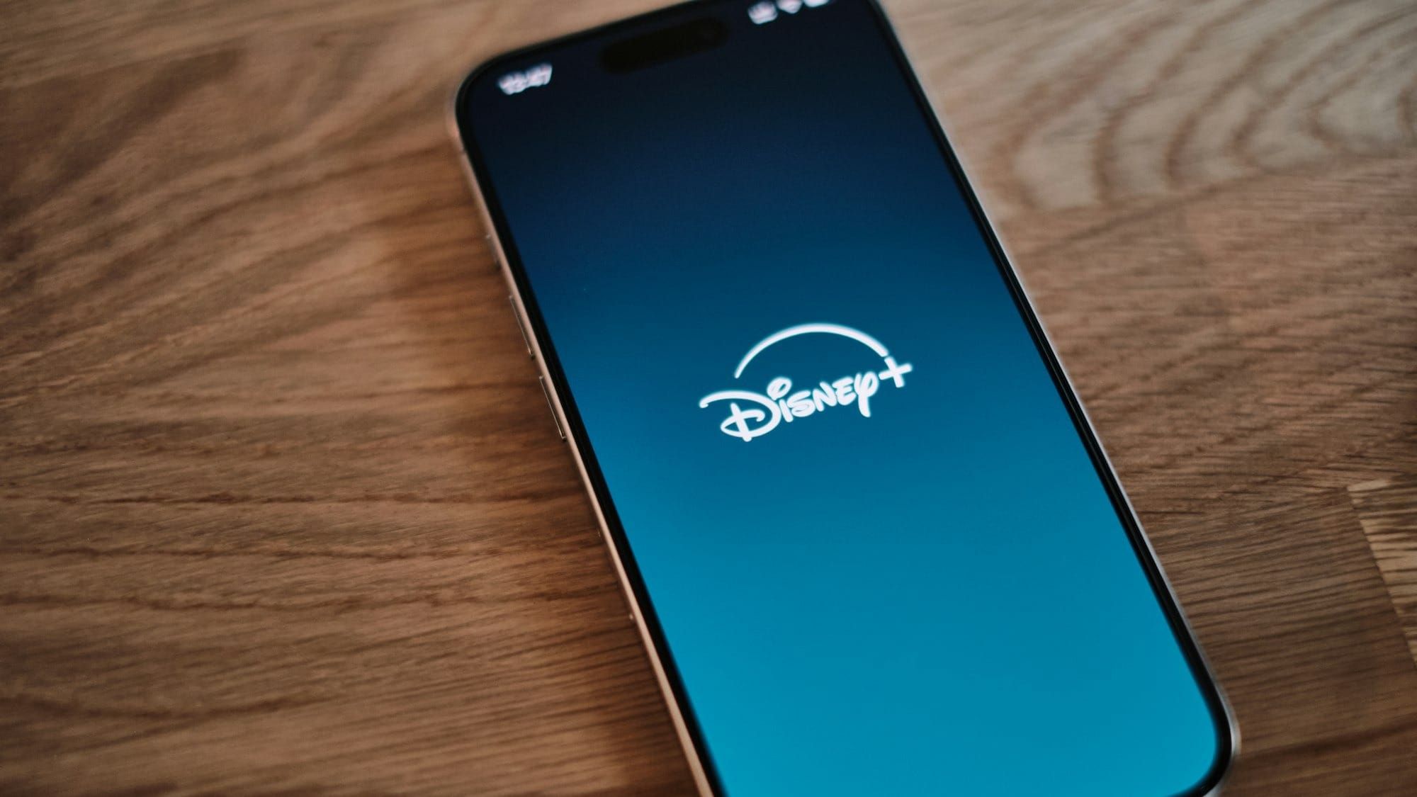 A phone loading Disney Plus