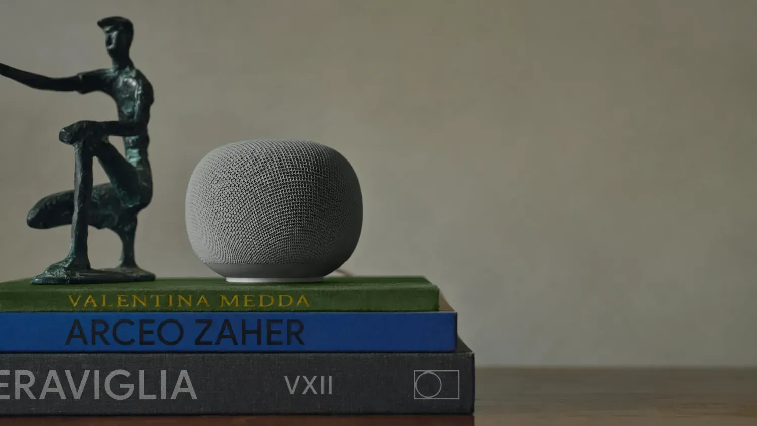 The new Google Home speaker on a pile of books