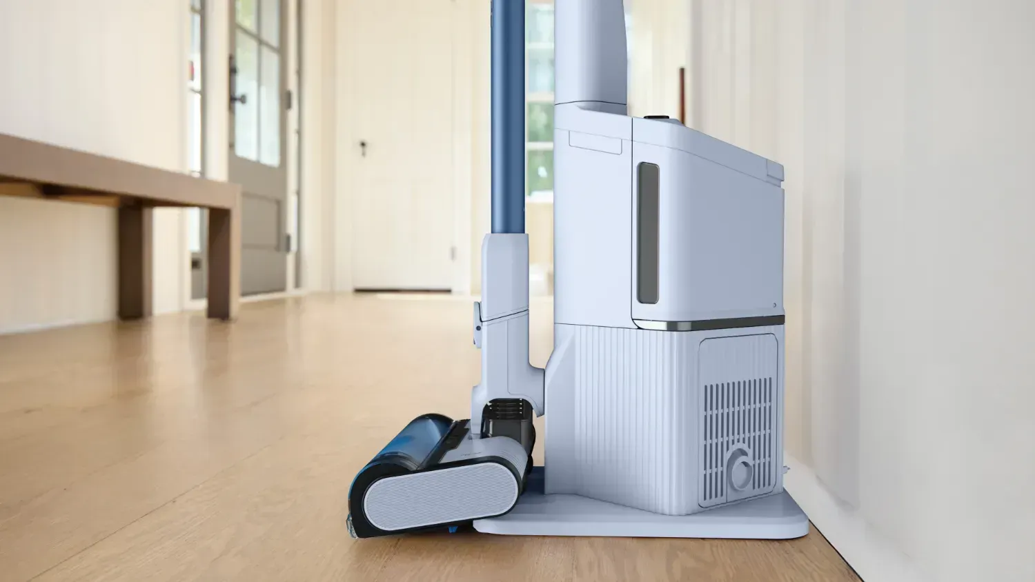 The Shark PowerLite vacuum on. its dock in a home