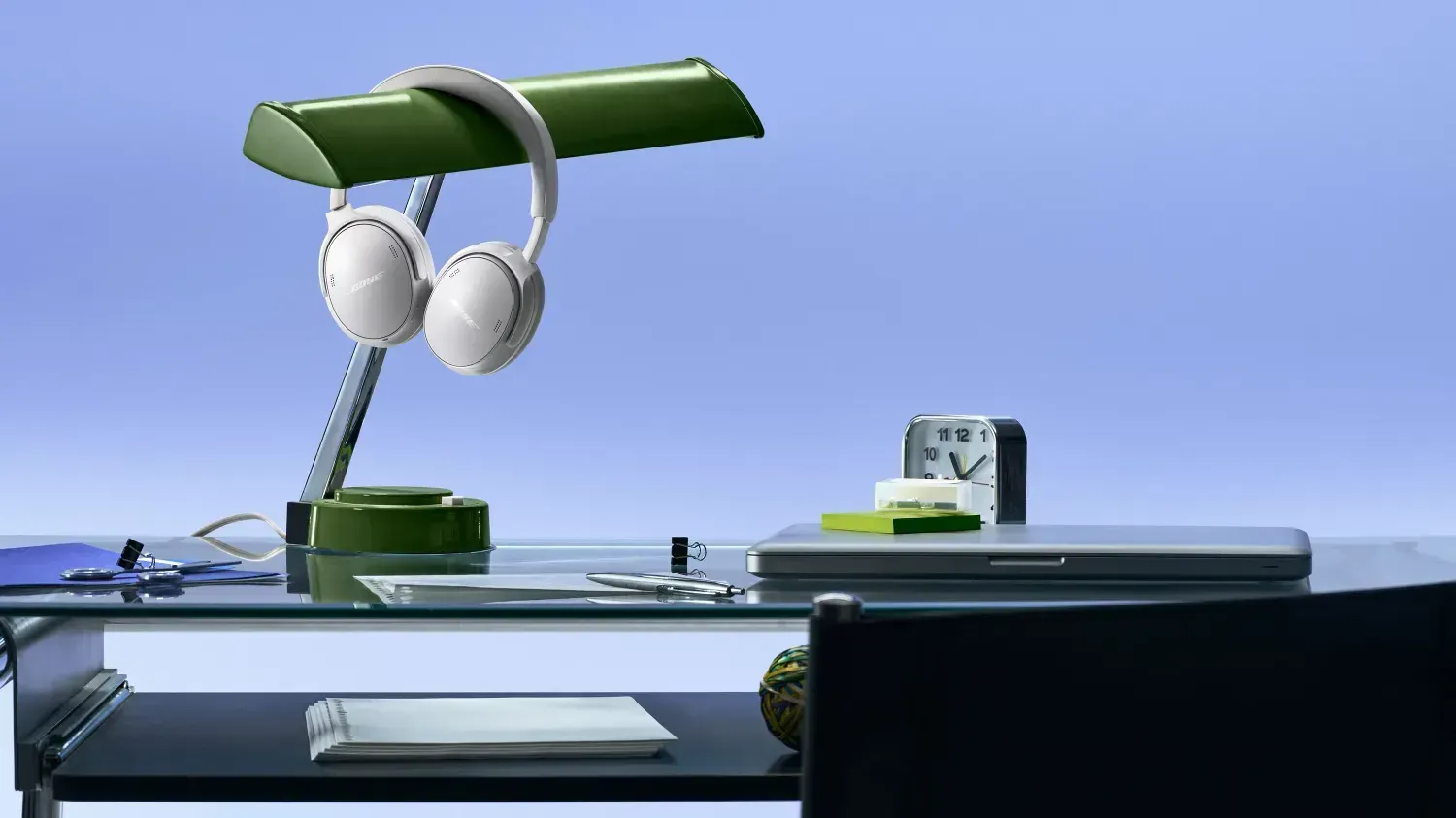 The Bose QuietCompfor Headphones 2nd gen hanging on a desk lamp