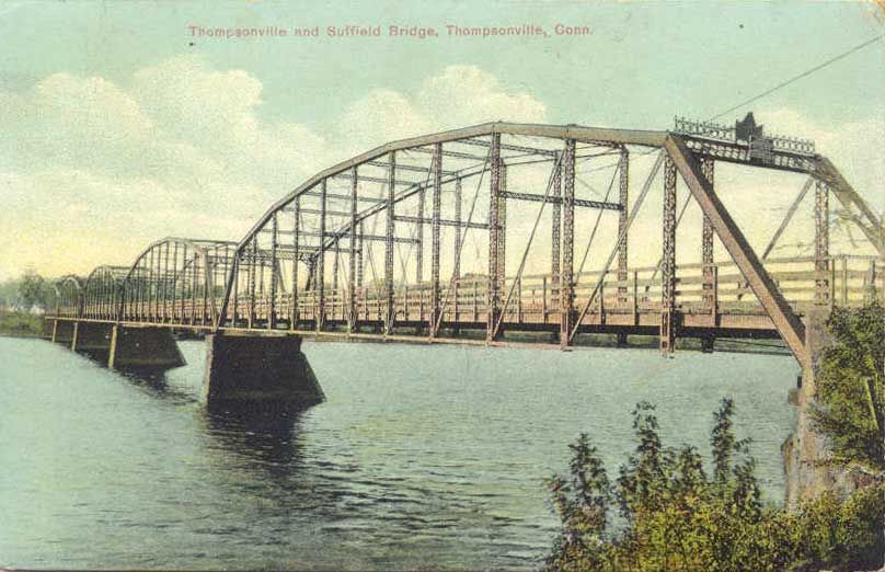 Vintage color postcard illustrating a large steel truss bridge spanning a wide river.