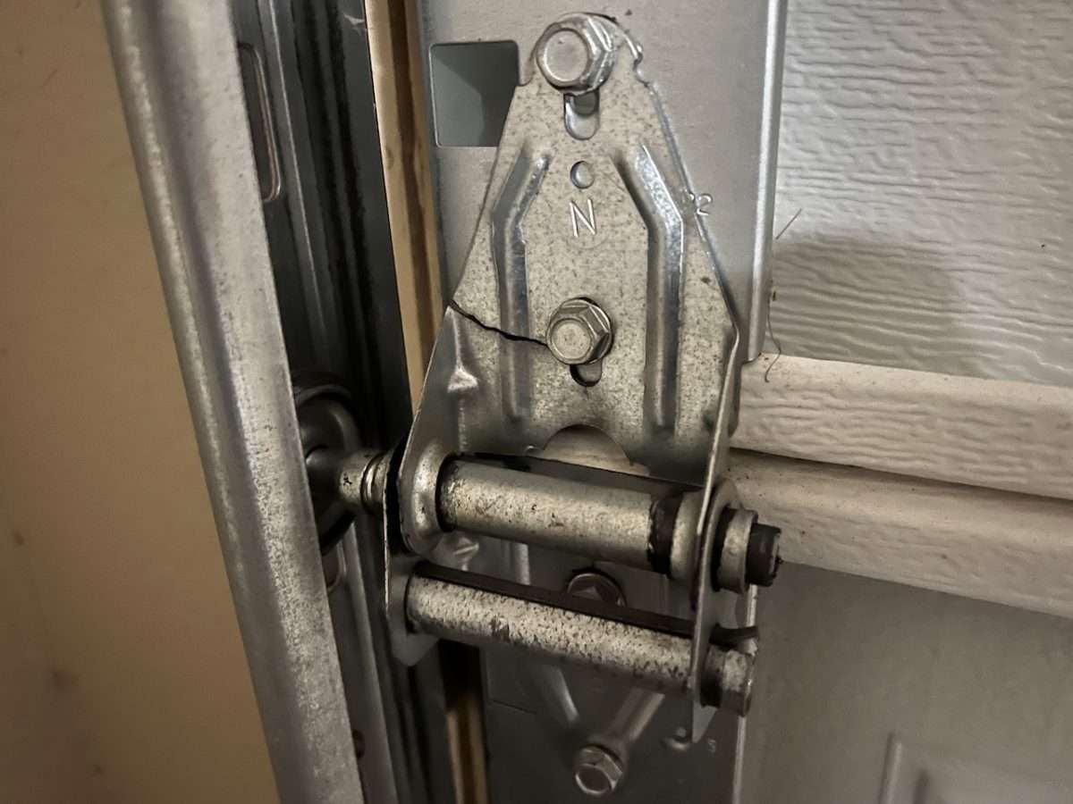 How To Repair a Garage Door Hinge