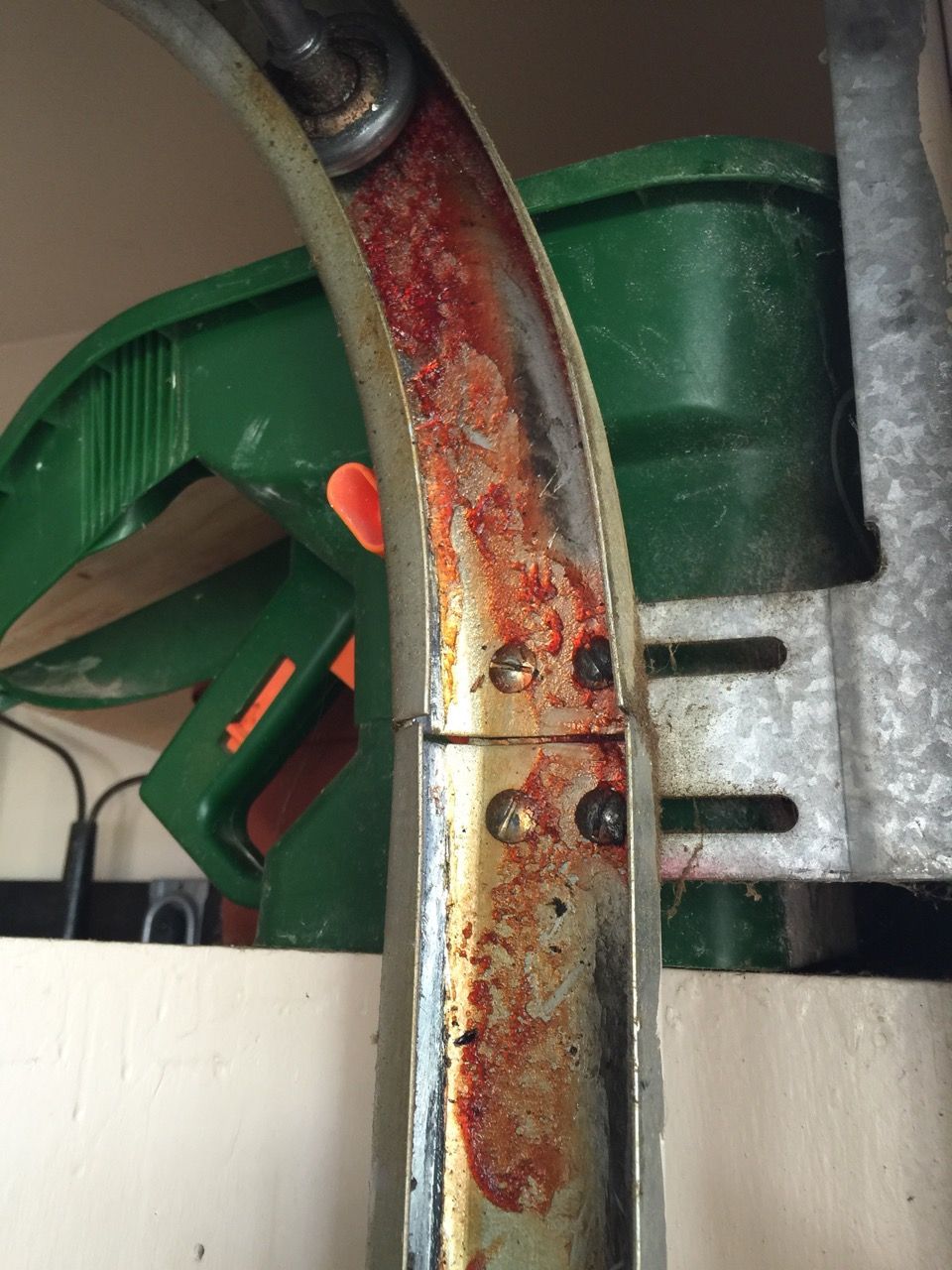 Should You Grease a Garage Door Track?