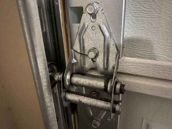 How To Repair a Garage Door Hinge