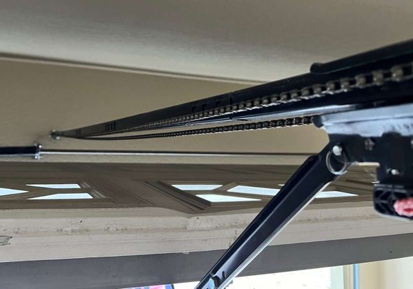 How To Tighten a Loose Garage Door Chain or Belt