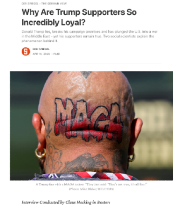 Bald man with "MAGA" tattooed in large letters on the back of his head. He wears hoop earrings, and a U.S. flag-patterned bandana around his neck.