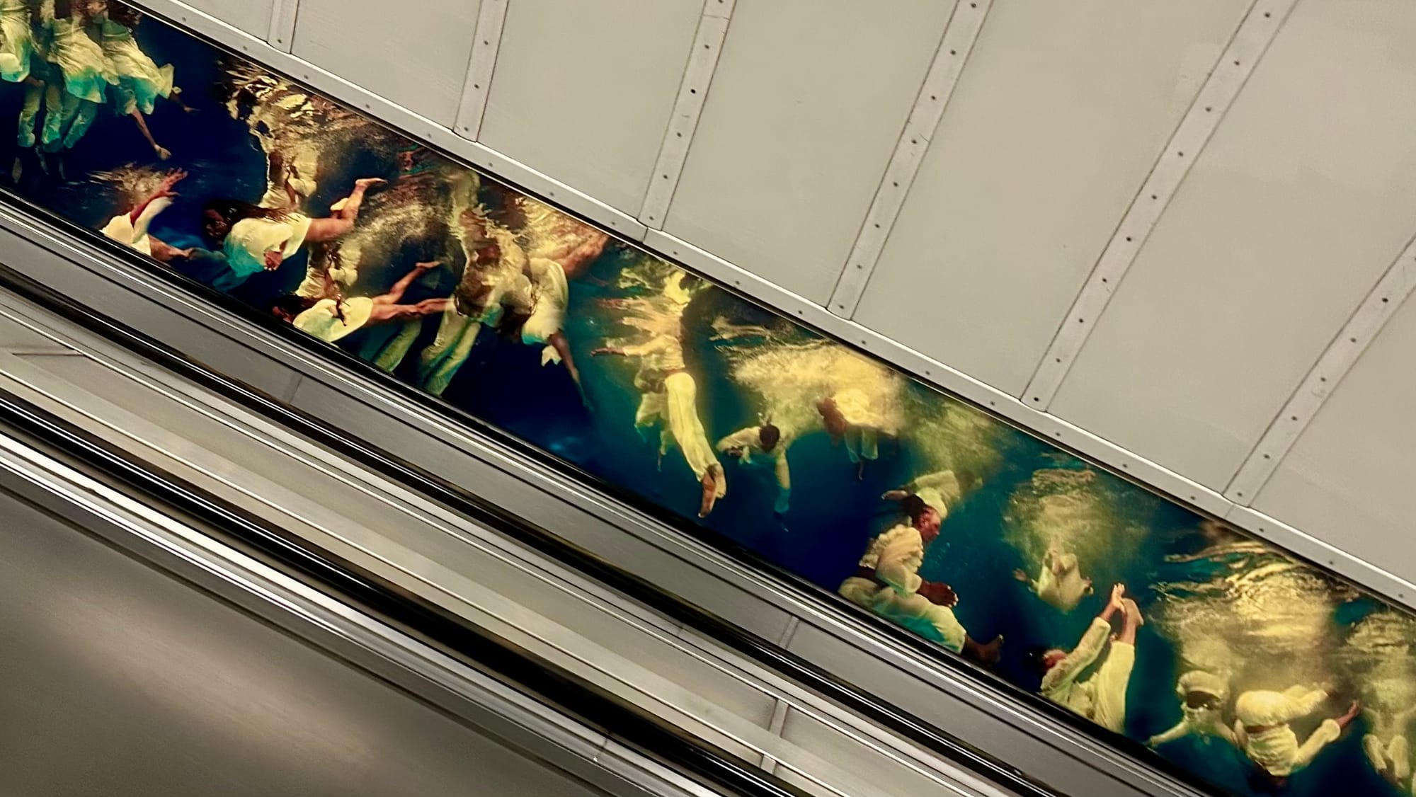 we move through scales of blue by Phoebe Barwell, an artwork installed at Bethnal Green tube station.