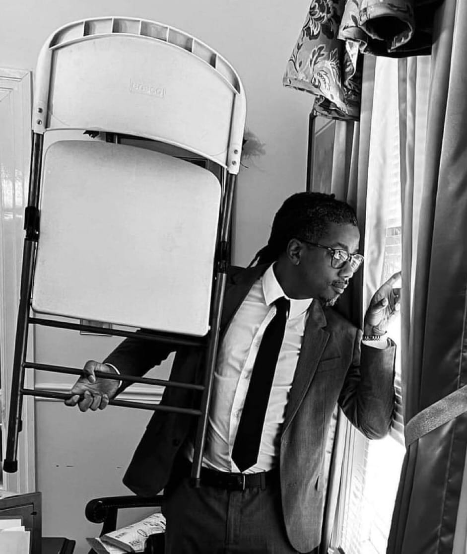 Recreation of the iconic Malcolm X looking-out-the window photo to commemorate the Alabama Sweet Tea Party.