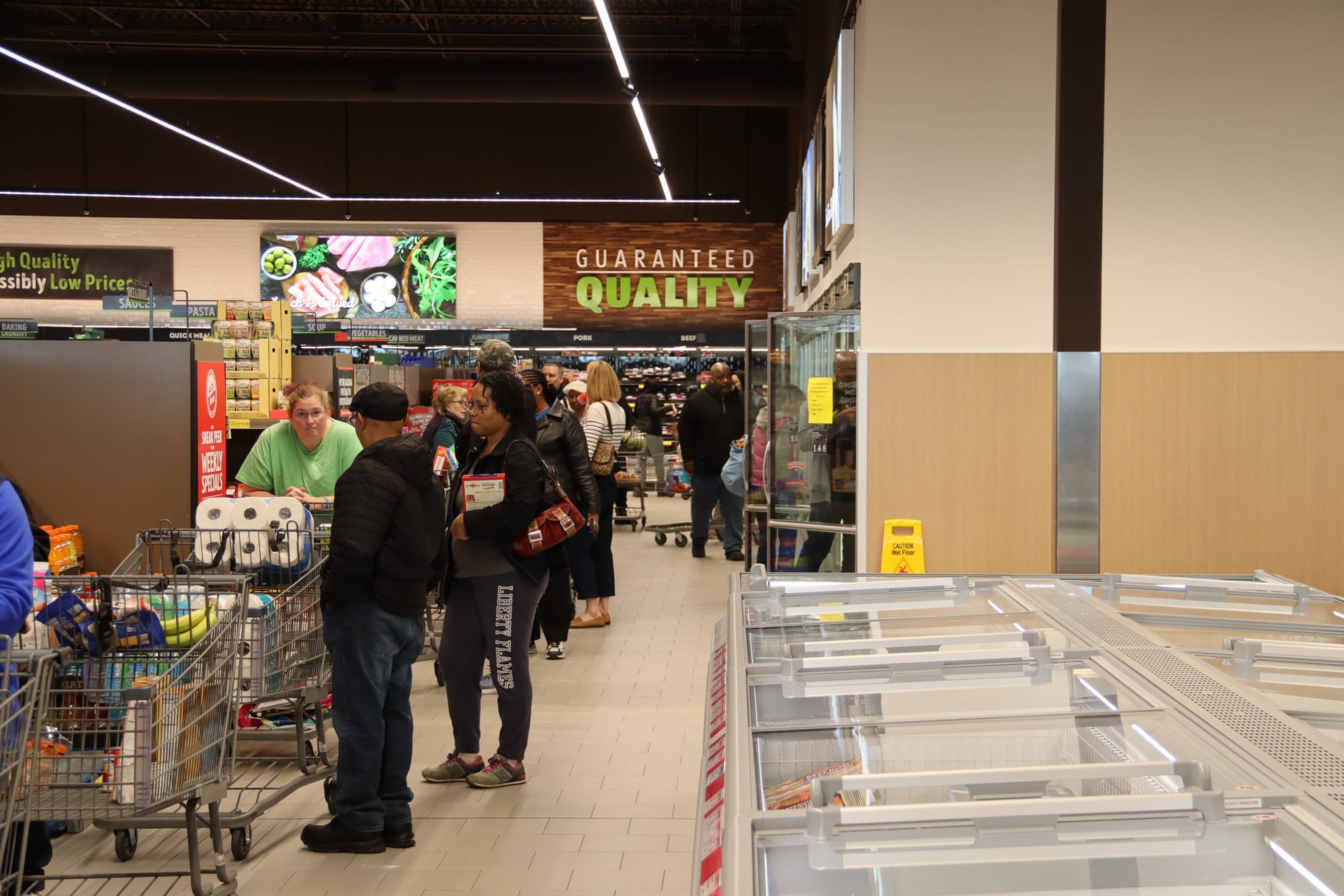 Long lines at Laurel, Maryland Aldi store as pandemic preparations begin.  2020.