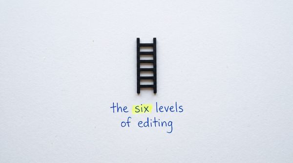 A miniature black ladder on white paper with the handwritten words: the six levels of editing. The word six is highlighted.