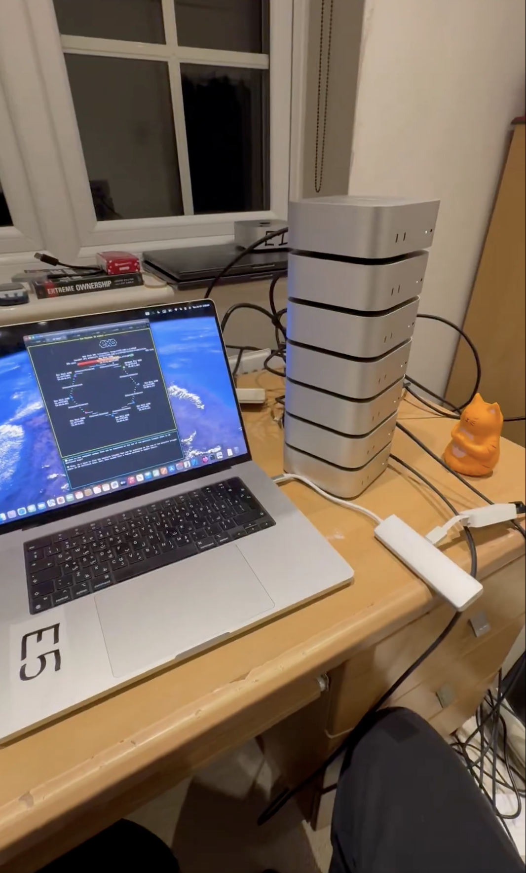 Alex Cheema- Running DeepSeek R1 across my 7 M4 Pro Mac Minis and 1 M4 Max MacBook Pro.
