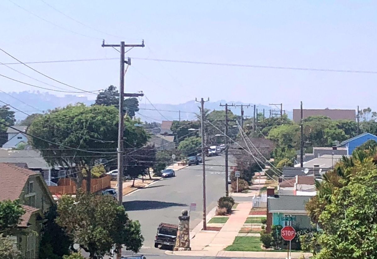 Warm temperatures and smokey skies combine to reduce air quality