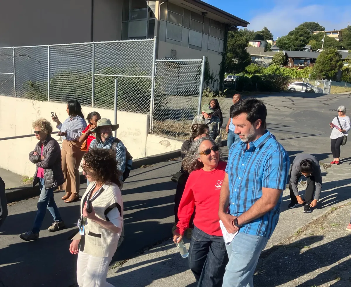 School district property committee tours shuttered school sites, hears new zoning data