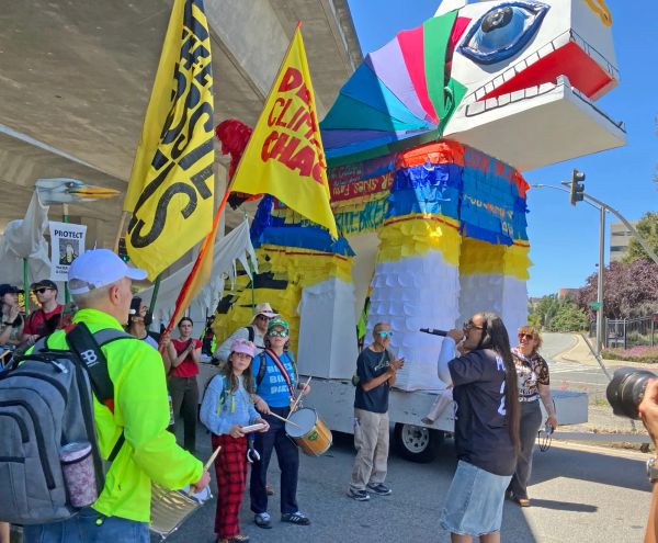 Richmond marchers haul giant Trojan horse to Chevron's gates on Anti-Chevron Day