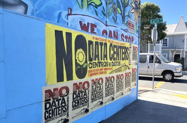 'No Data Centers' posters on a mural wall at South 6th Street in Richmond