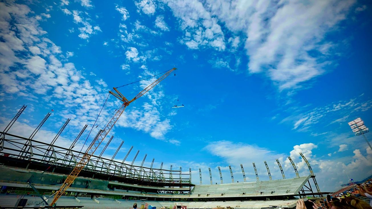 Video: Final beam of 6,500 pieces of steel installed at KU's new Booth