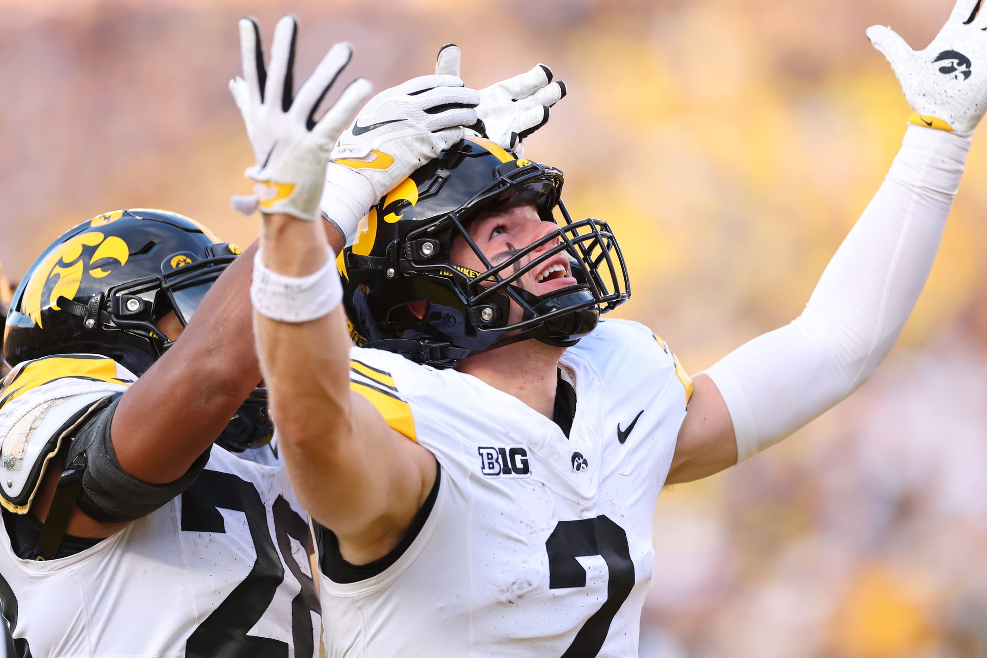 ANN ARBOR, MICHIGAN - SEPTEMBER 26: Reece Vander Zee #2 of the Iowa Hawkeyes celebrates his second half touchdown with Kamari Moulton #28 while playing the Michigan Wolverines at Michigan Stadium on September 26, 2026 in Ann Arbor, Michigan. (Photo by Gregory Shamus/Getty Images)
