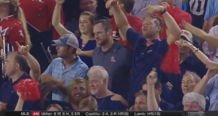 A crowd shot of drunken and exhilarated Ole Miss fans in the stands during Ole Miss's 2015 upset of Alabama in Tuscaloosa 