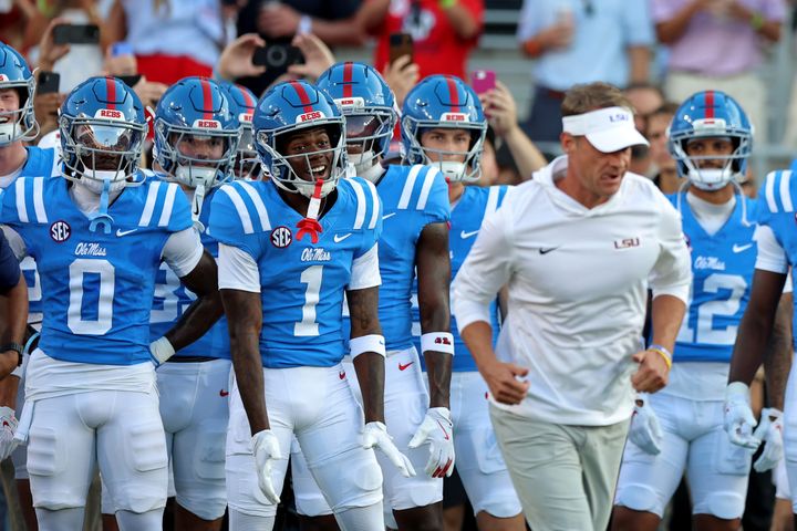 OXFORD, MISSISSIPPI - SEPTEMBER 19: Head coach Lane Kiffin of the Louisiana State Tigers takes the field before the game against the Mississippi Rebels at Vaught-Hemingway Stadium on Septembe