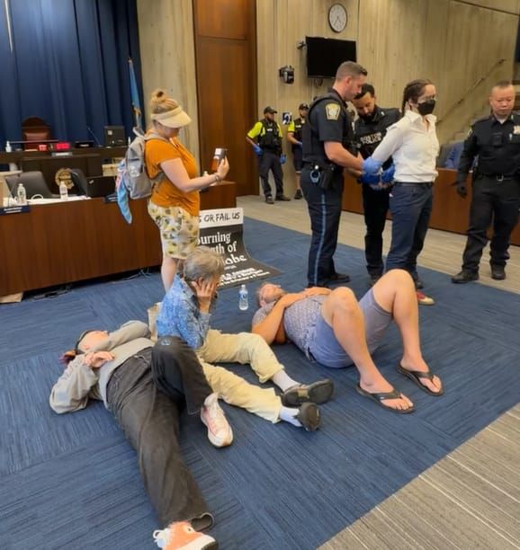 Lemonade stand held up at gunpoint; protesters stop Council budget deliberations; lemonade stand