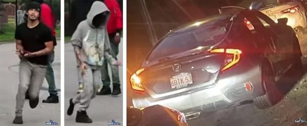 One man with black T and shiesty, other in gray hoodie, their Civic.