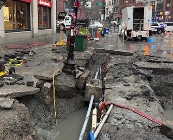 Chinatown flooded - from below; parking-lot scam in the Fenway