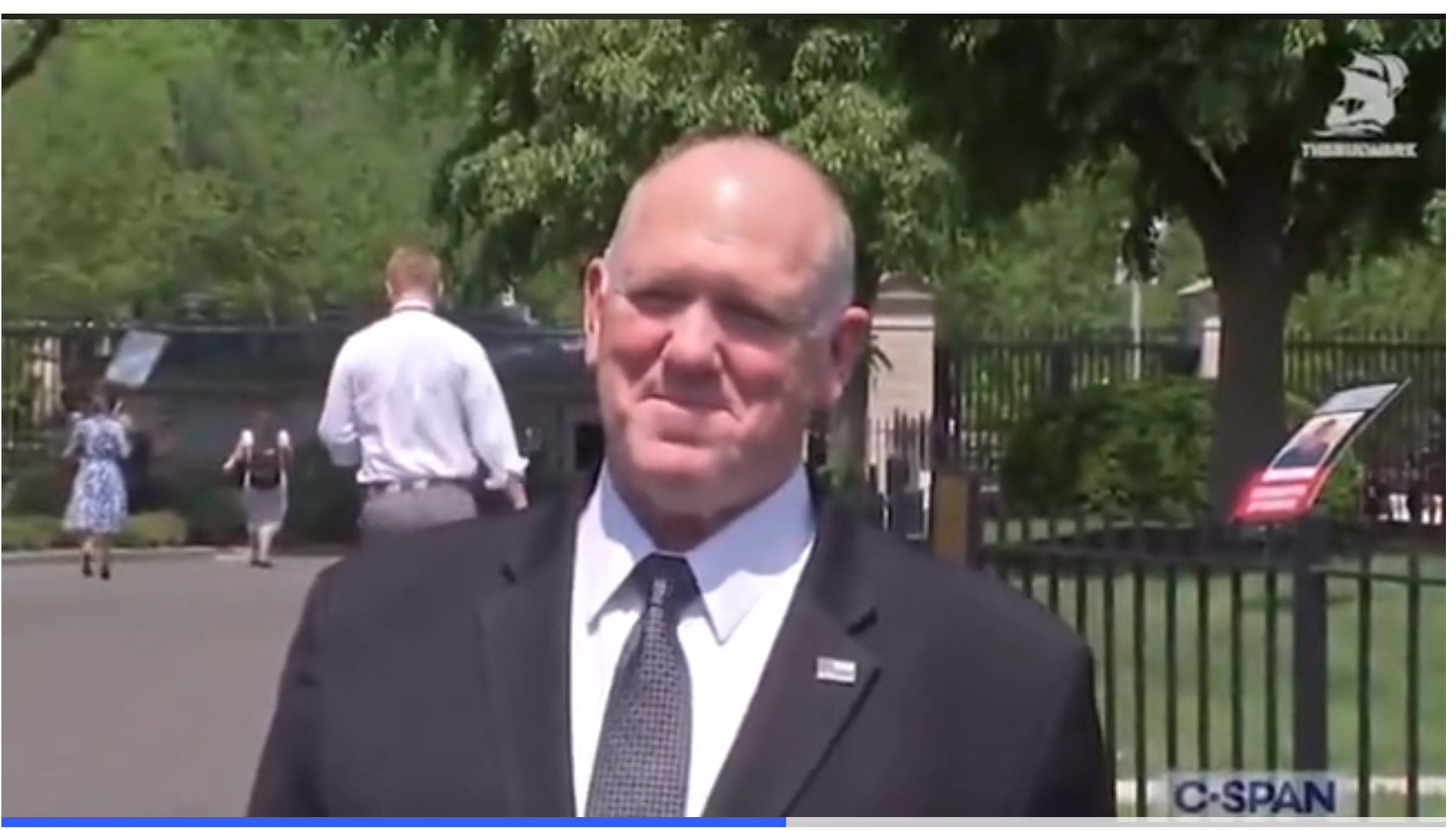 skinhead fuck in a suit practically licking his lips at the thought of locking more people up
