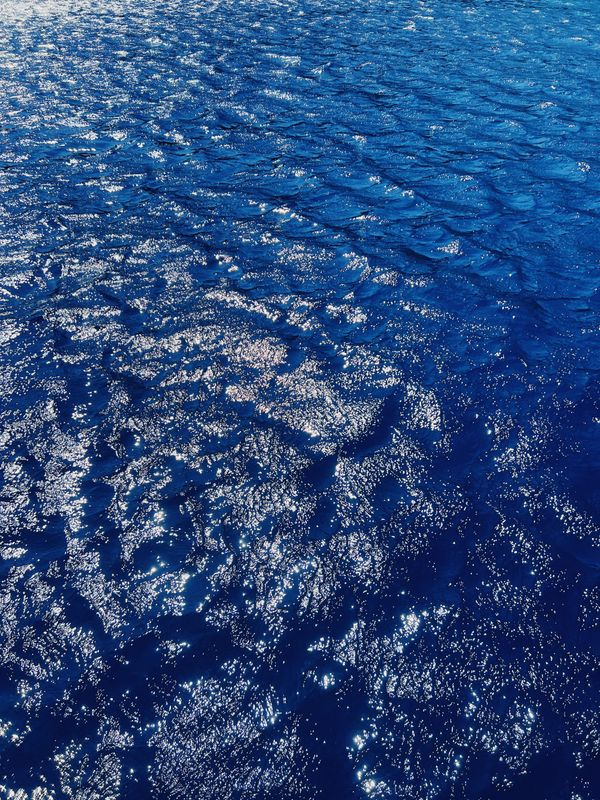 echoes of sun on water