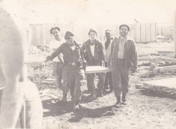 Che Guevara puts his ideas into action by doing volunteer work