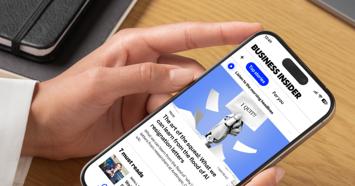 A "Listen to the morning headline" prompt appears at the top of the Business Insider app homepage.