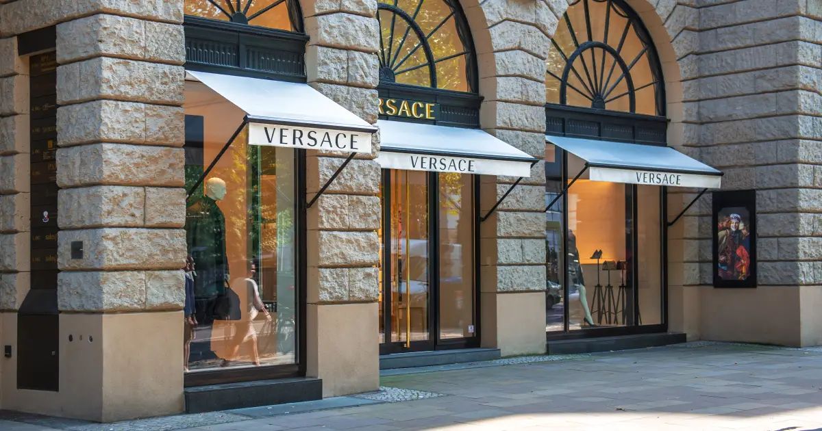Cosmico - Prada Looks to Buy Versace