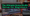 Home studio setup with monitor, DAW session, audio interface, and speakers displayed on a desk for beginner music production