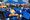 Santa Monica College graduates in caps and gowns crossing the stage at Corsair Field during the 96th commencement ceremony in Santa Monica, California.