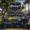 Row of classic and exotic automobiles displayed on San Vicente Boulevard during Brentwood Concours car show