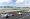 Looking north-west from the main building, across the primary runway, at the control tower of Santa Monica Airport with a few