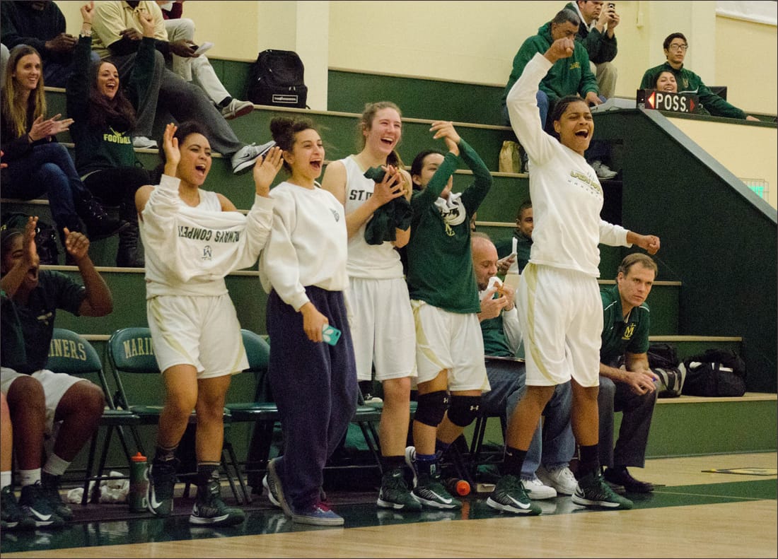 St. Monica's bench roots for their teammates on Tuesday against Mary Star. (Photo by Paul Alvarez Jr.)