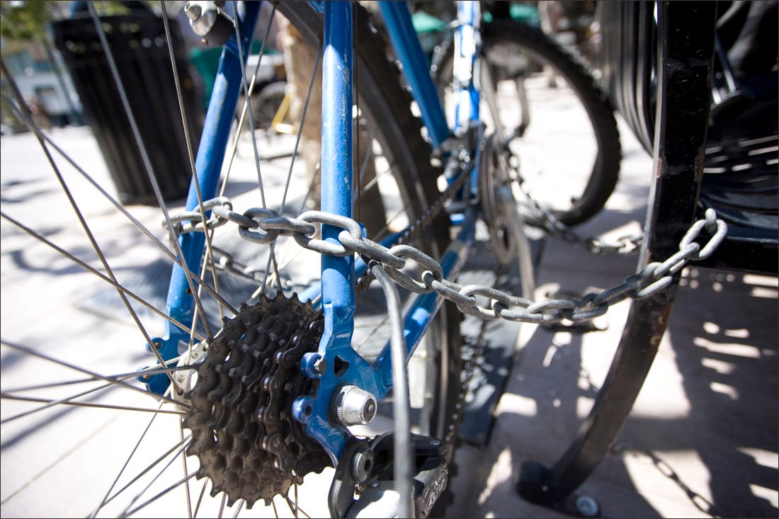 LOCKING IT UP: Santa Monica police recommend using a sturdy U-lock to secure bikes left unattended, not a chain like the one pictured. (File photo)
