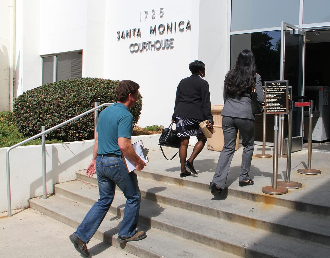 People enter the Santa Monica Courthouse on Monday. (Photo by Daniel Archuleta)