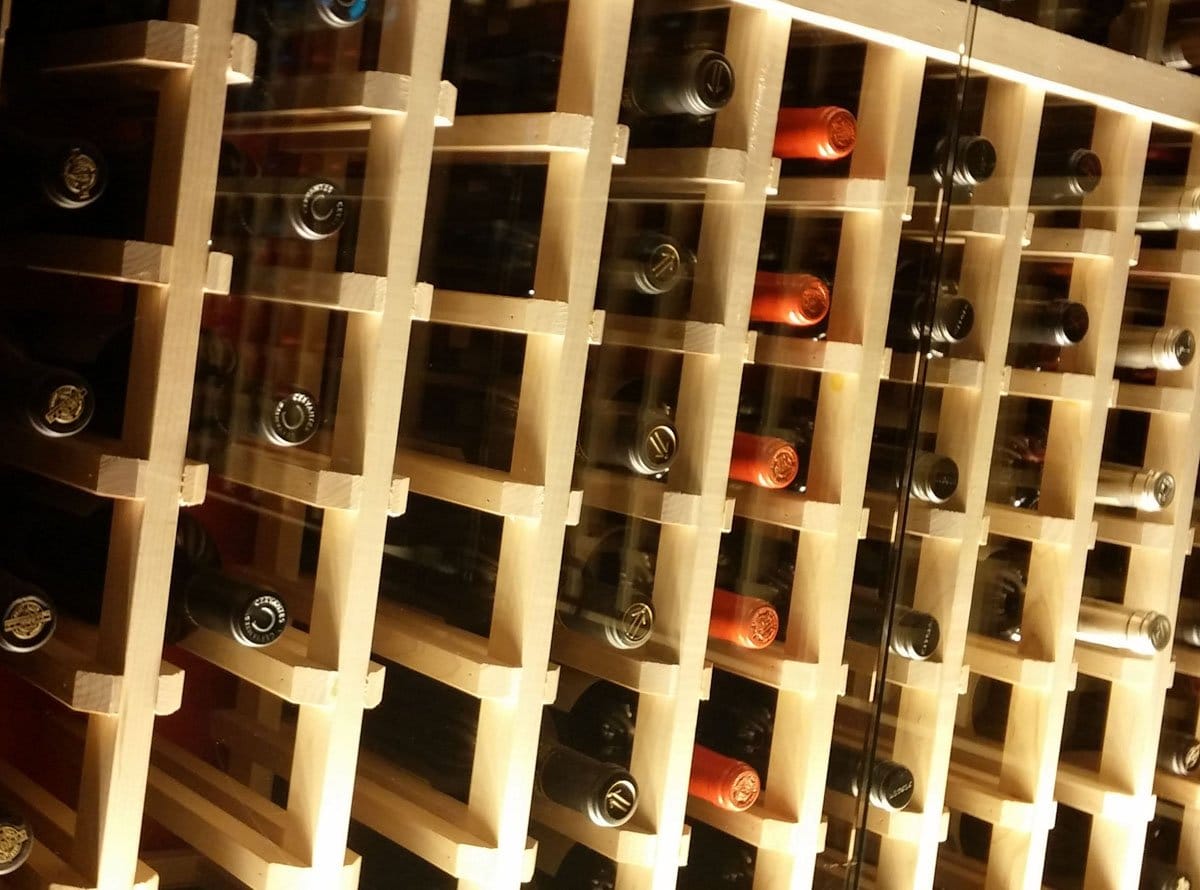 DRINK UP: Del Frisco's Grille has an extensive wine list with bottles lining the walls. (Kevin Herrera kevinh@www.smdp.com)