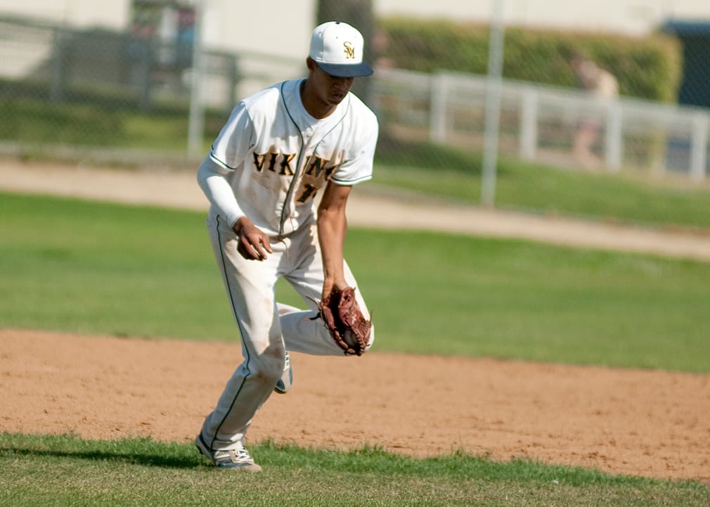 GOTCHA: Samohi's Ryan Barbarin makes a play on a ground ball against Morningside on Tuesday.  (Photo by Morgan Genser)