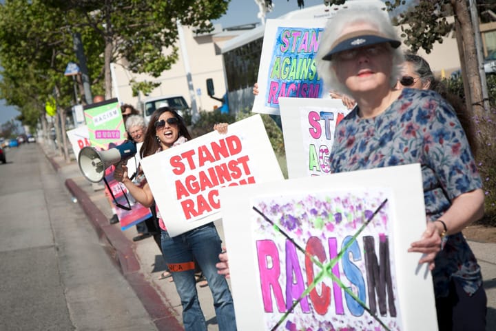 Santa Monica/Westside YWCA members held a rally Friday along Pico Boulevard as part of the national Stand Against Racism movement, which aims to eliminate discrimination and celebrate diversity. (Brandon Wise brandonw@www.smdp.com)